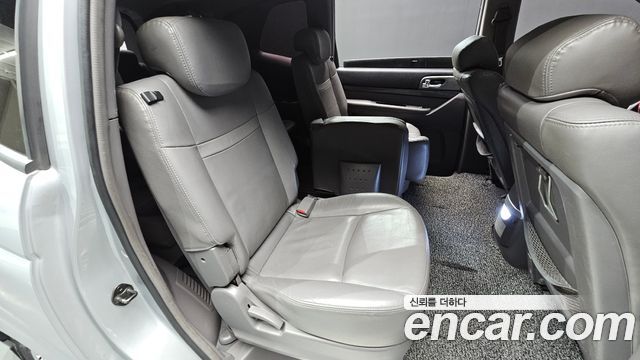 KG Mobility (SsangYong) Korando Turismo 4WD RT 11-seater 2014 — фото 11