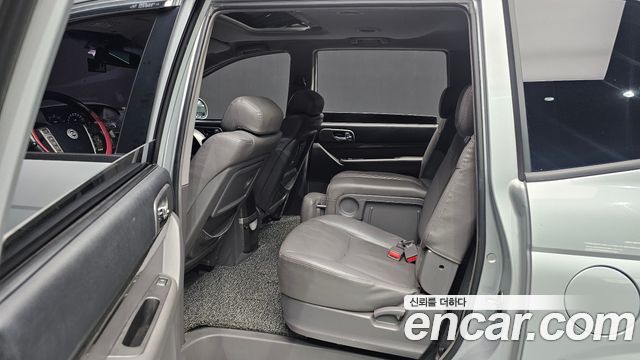 KG Mobility (SsangYong) Korando Turismo 4WD RT 11-seater 2014 — фото 12