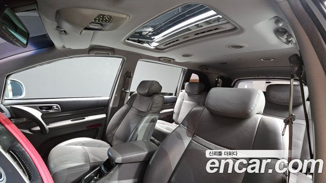 KG Mobility (SsangYong) Korando Turismo 4WD RT 11-seater 2014 — фото 13