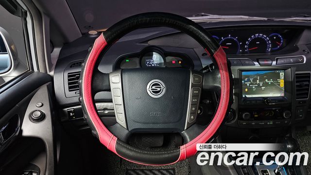 KG Mobility (SsangYong) Korando Turismo 4WD RT 11-seater 2014 — фото 14
