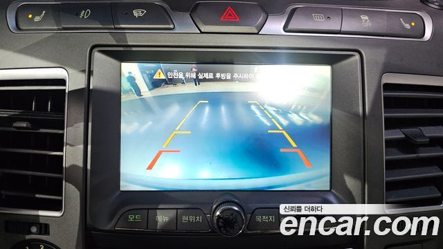 KG Mobility (SsangYong) Korando Turismo 4WD RT 11-seater 2014 — фото 16