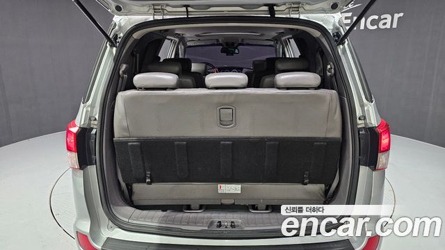 KG Mobility (SsangYong) Korando Turismo 4WD RT 11-seater 2014 — фото 20