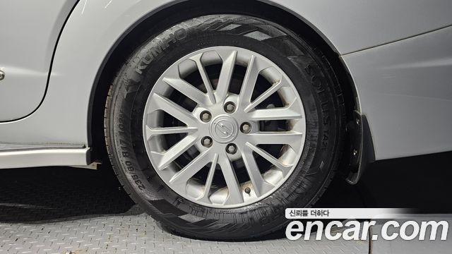 KG Mobility (SsangYong) Korando Turismo 4WD RT 11-seater 2014 — фото 21