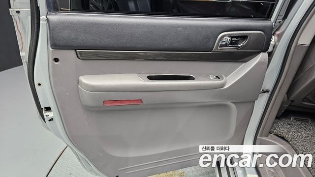 KG Mobility (SsangYong) Korando Turismo 4WD RT 11-seater 2014 — фото 25