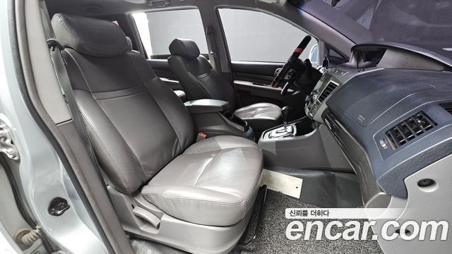 KG Mobility (SsangYong) Korando Turismo 4WD RT 11-seater 2014 — фото 26
