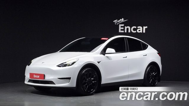 Tesla Model Y Long Range AWD 2024 — фото 11
