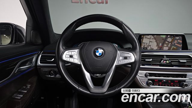 BMW 7 Series (G11) 740Li xDrive Design Pure Excellence 2020 — фото 13