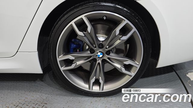 BMW 5 Series (G30) M550i xDrive 2022 — фото 21