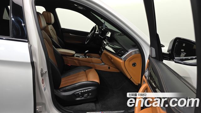 BMW X6 (F16) M50d 2016 — фото 11