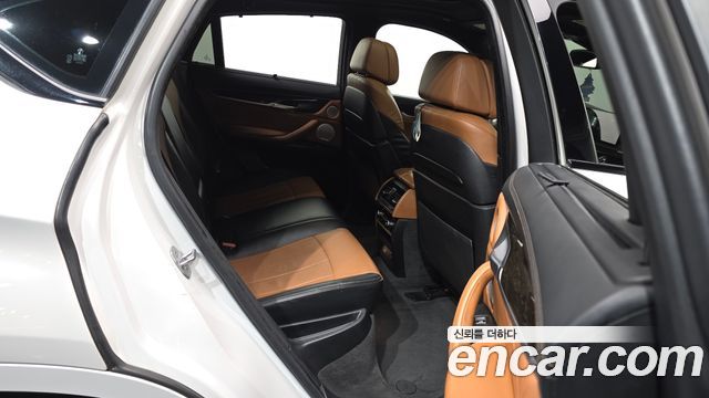 BMW X6 (F16) M50d 2016 — фото 12