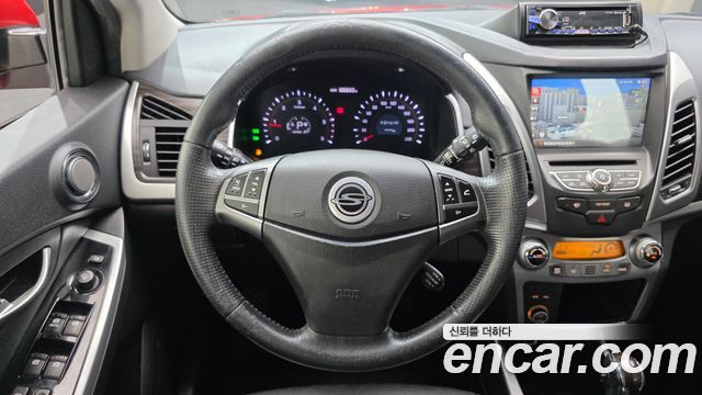 KG Mobility (SsangYong) Korando C 2.0 CVT 4WD Deluxe 2014 — фото 12