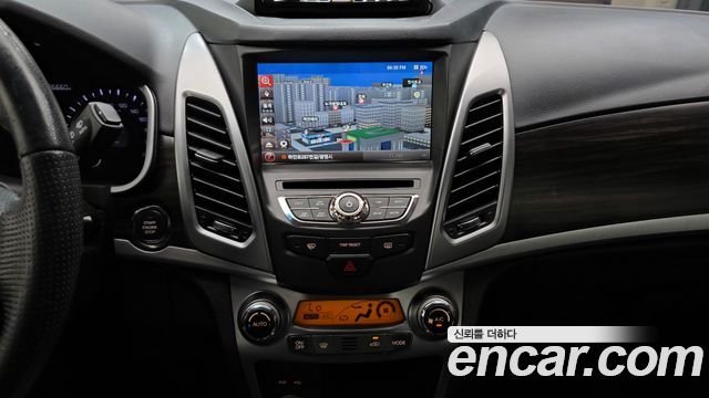 KG Mobility (SsangYong) Korando C 2.0 CVT 4WD Deluxe 2014 — фото 19