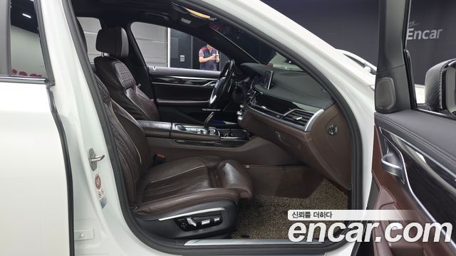 BMW 7 Series (G11) 740d xDrive M Sport 2016 — фото 11