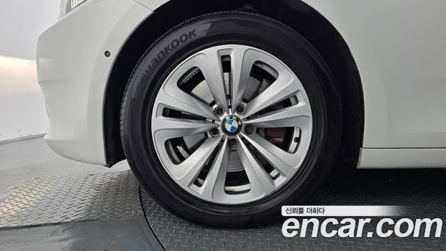 BMW 5 Series GT (F07) GT 30d 2011 — фото 5