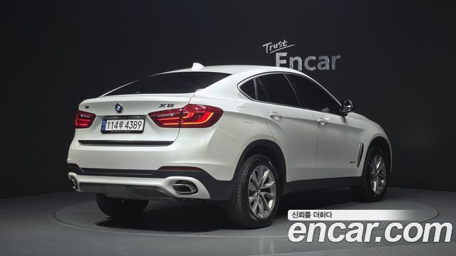 BMW X6 (F16) xDrive 35i 2019 — фото 2