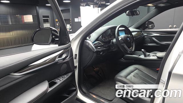 BMW X6 (F16) xDrive 35i 2019 — фото 10