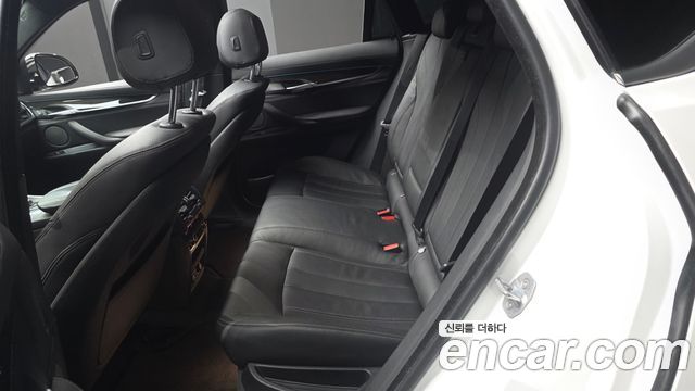 BMW X6 (F16) xDrive 35i 2019 — фото 11