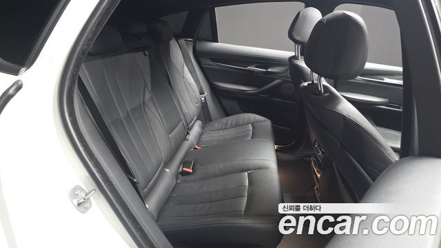 BMW X6 (F16) xDrive 35i 2019 — фото 12
