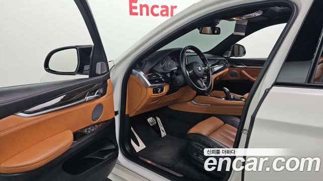 BMW X6 (F16) M50d 2015 — фото 10