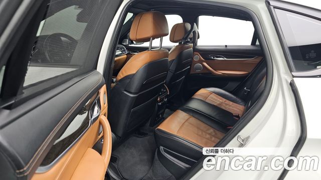 BMW X6 (F16) M50d 2015 — фото 11