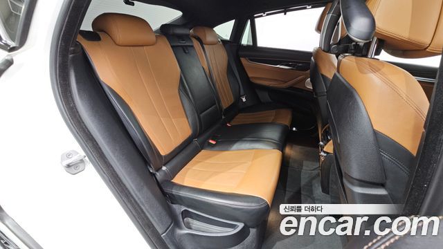 BMW X6 (F16) M50d 2015 — фото 12