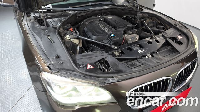 BMW 7 Series (F01) 740Li 2013 — фото 6