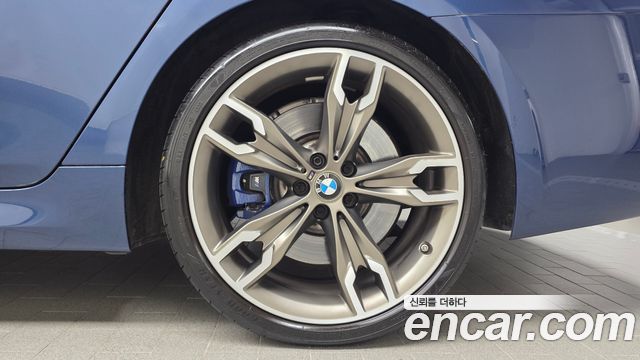 BMW 5 Series (G30) M550i xDrive 2021 — фото 27