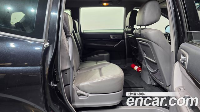 KG Mobility (SsangYong) Korando Turismo 4WD TX 11-seater 2016 — фото 12