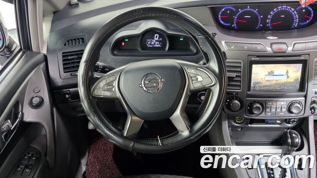 KG Mobility (SsangYong) Korando Turismo 4WD TX 11-seater 2016 — фото 13
