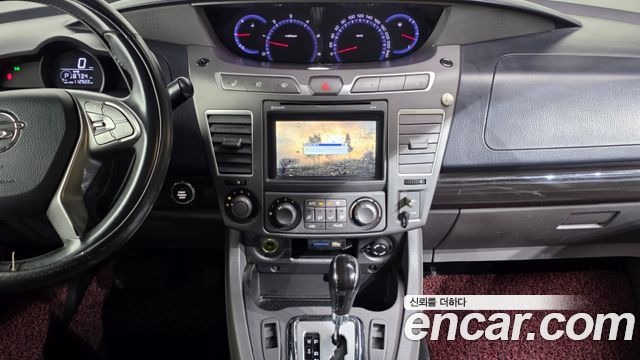 KG Mobility (SsangYong) Korando Turismo 4WD TX 11-seater 2016 — фото 14