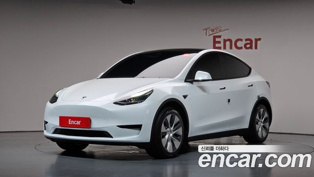 Tesla Model Y RWD 2024 — фото 1