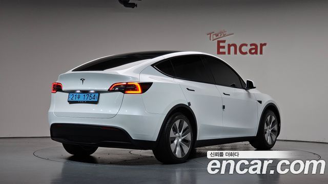 Tesla Model Y RWD 2024 — фото 2