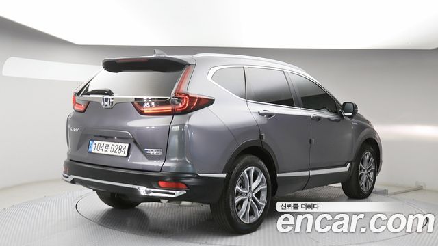 Honda CR-V (V) 2.0 Hybrid Touring 4WD 2022 — фото 2
