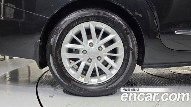 KG Mobility (SsangYong) Korando Turismo 4WD RT 11-seater 2014 — фото 5