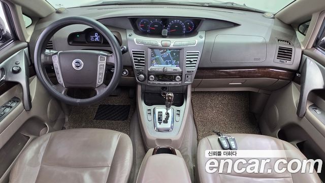 KG Mobility (SsangYong) Korando Turismo 4WD RT 11-seater 2014 — фото 7