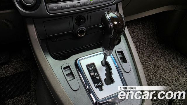 KG Mobility (SsangYong) Korando Turismo 4WD RT 11-seater 2014 — фото 9
