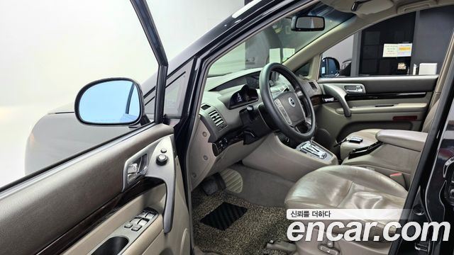 KG Mobility (SsangYong) Korando Turismo 4WD RT 11-seater 2014 — фото 11
