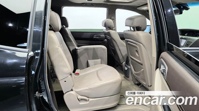 KG Mobility (SsangYong) Korando Turismo 4WD RT 11-seater 2014 — фото 12