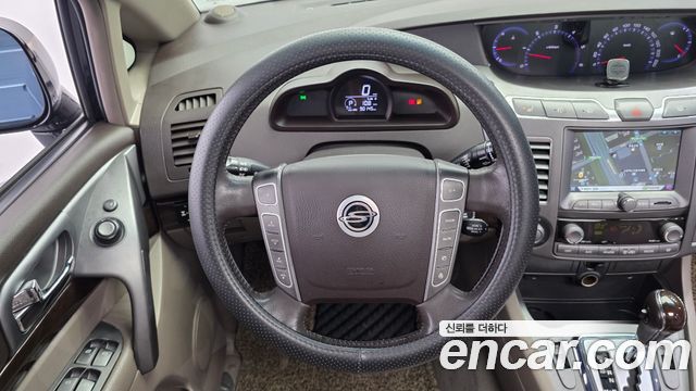 KG Mobility (SsangYong) Korando Turismo 4WD RT 11-seater 2014 — фото 13