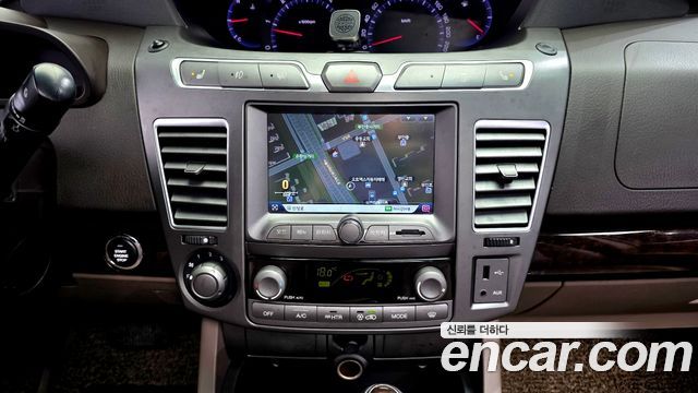 KG Mobility (SsangYong) Korando Turismo 4WD RT 11-seater 2014 — фото 14