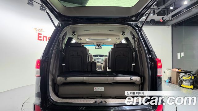 KG Mobility (SsangYong) Korando Turismo 4WD RT 11-seater 2014 — фото 19