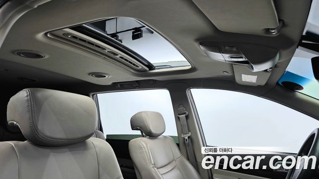 KG Mobility (SsangYong) Korando Turismo 4WD RT 11-seater 2014 — фото 20