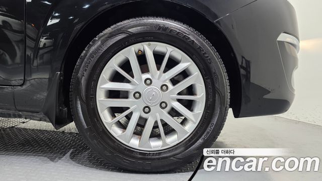 KG Mobility (SsangYong) Korando Turismo 4WD RT 11-seater 2014 — фото 21
