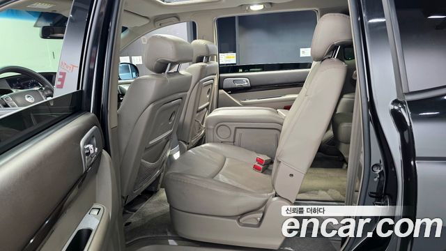 KG Mobility (SsangYong) Korando Turismo 4WD RT 11-seater 2014 — фото 26