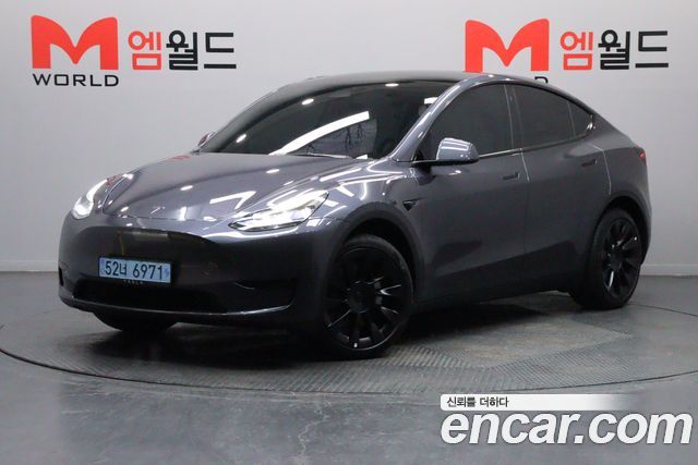 Tesla Model Y RWD 2024 — фото 1