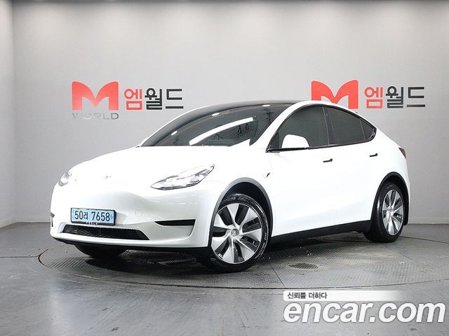 Tesla Model Y RWD 2024 — фото 1