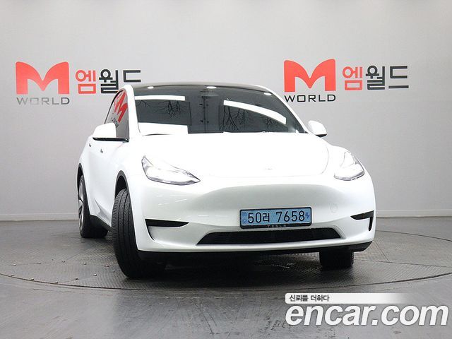 Tesla Model Y RWD 2024 — фото 2
