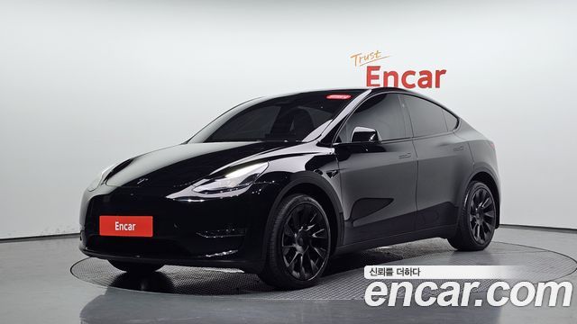 Tesla Model Y Long Range AWD 2024 — фото 11