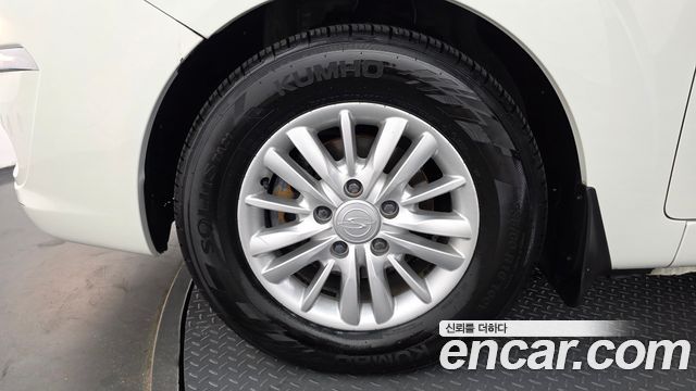 KG Mobility (SsangYong) Korando Turismo 4WD GT 11-seater 2014 — фото 5