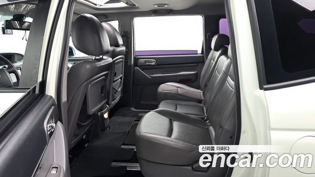 KG Mobility (SsangYong) Korando Turismo 4WD GT 11-seater 2014 — фото 12